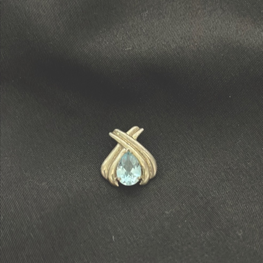 Elegant Sterling Silver and Teardrop Blue Topaz